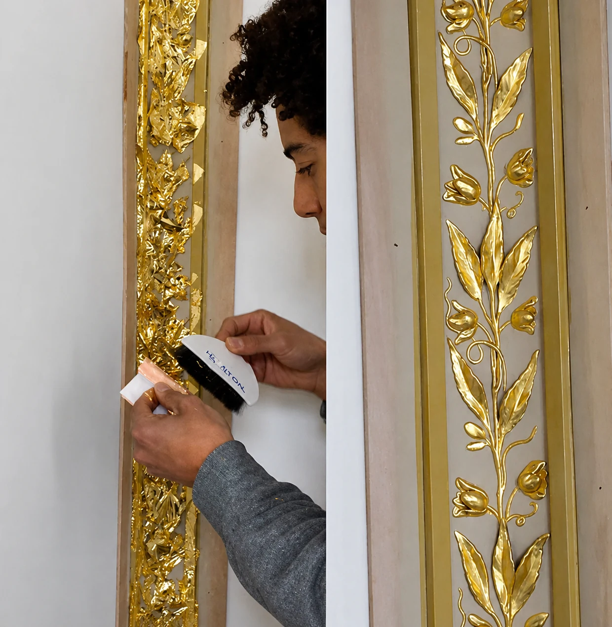 Artisan painting wall molding
